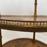 Pedestal table with three trays surrounded by an openwork brass gallery, late 19th century