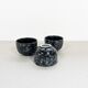 Black and gray ceramic mugs