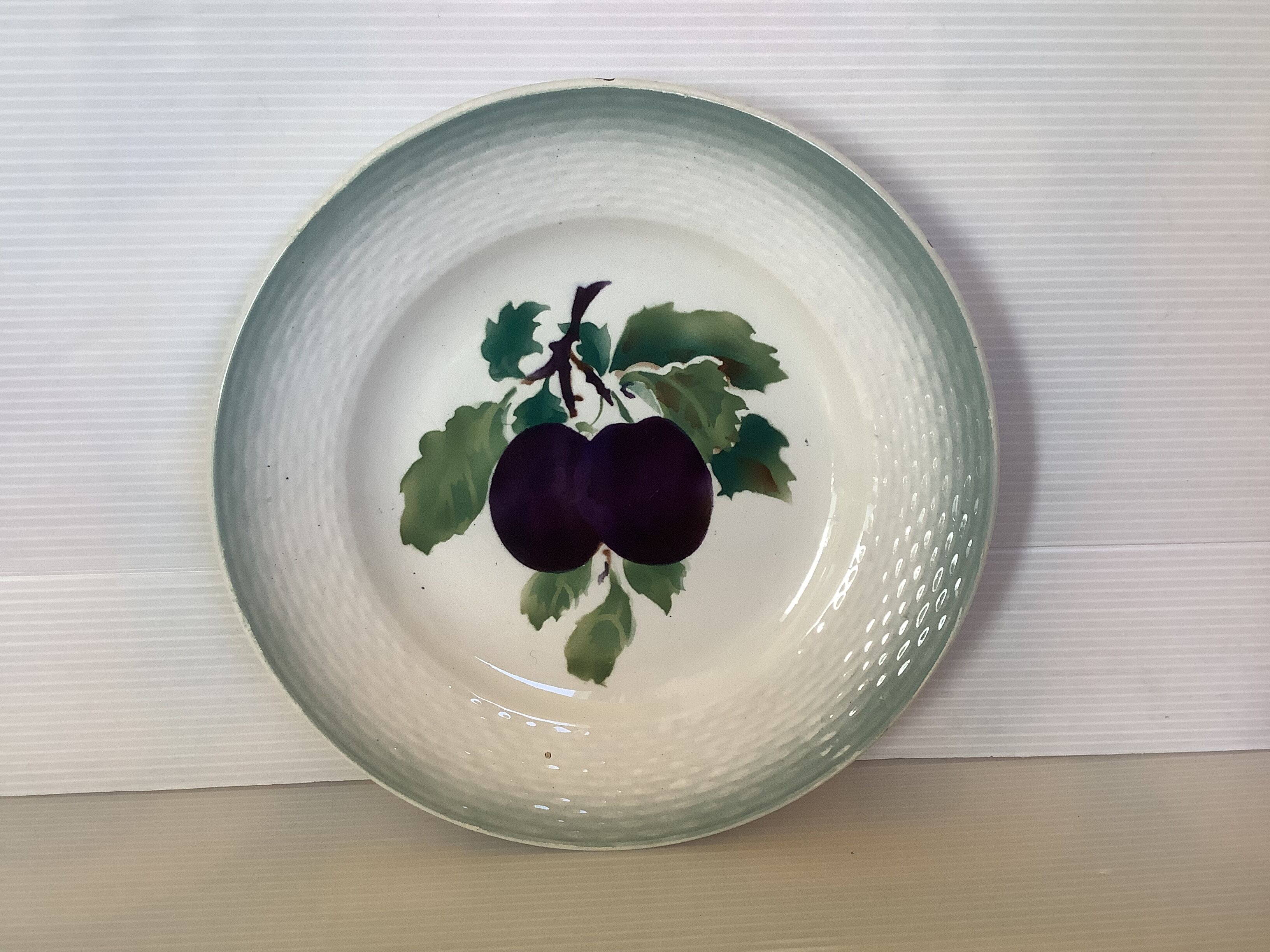 Pair of antique Saint Amand fruit plates.