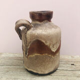 Ancient sided jug in flamed sandstone