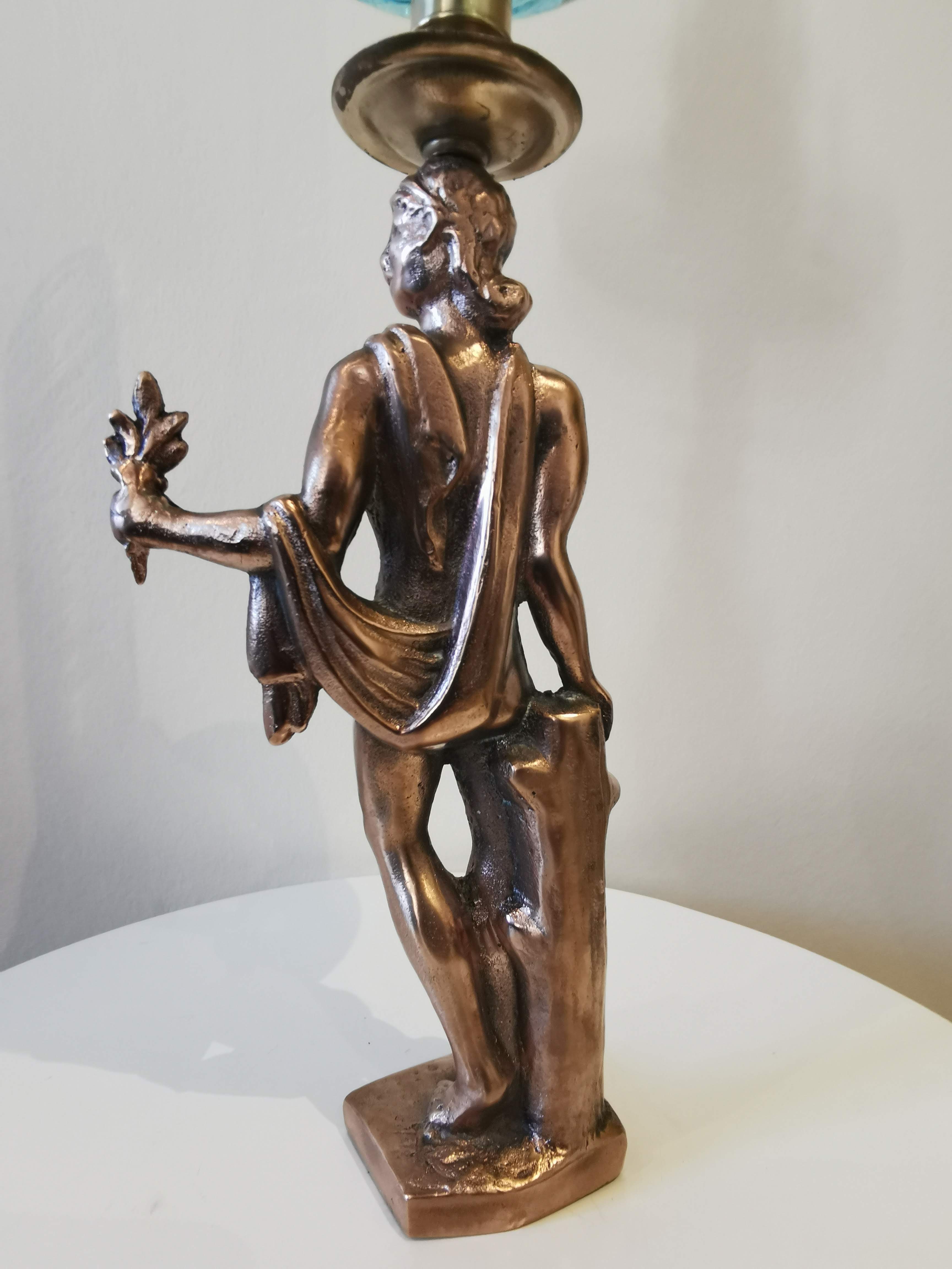 Large kerosene lamp mounted on bronze statue. Late nineteenth century