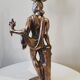 Large kerosene lamp mounted on bronze statue. Late nineteenth century