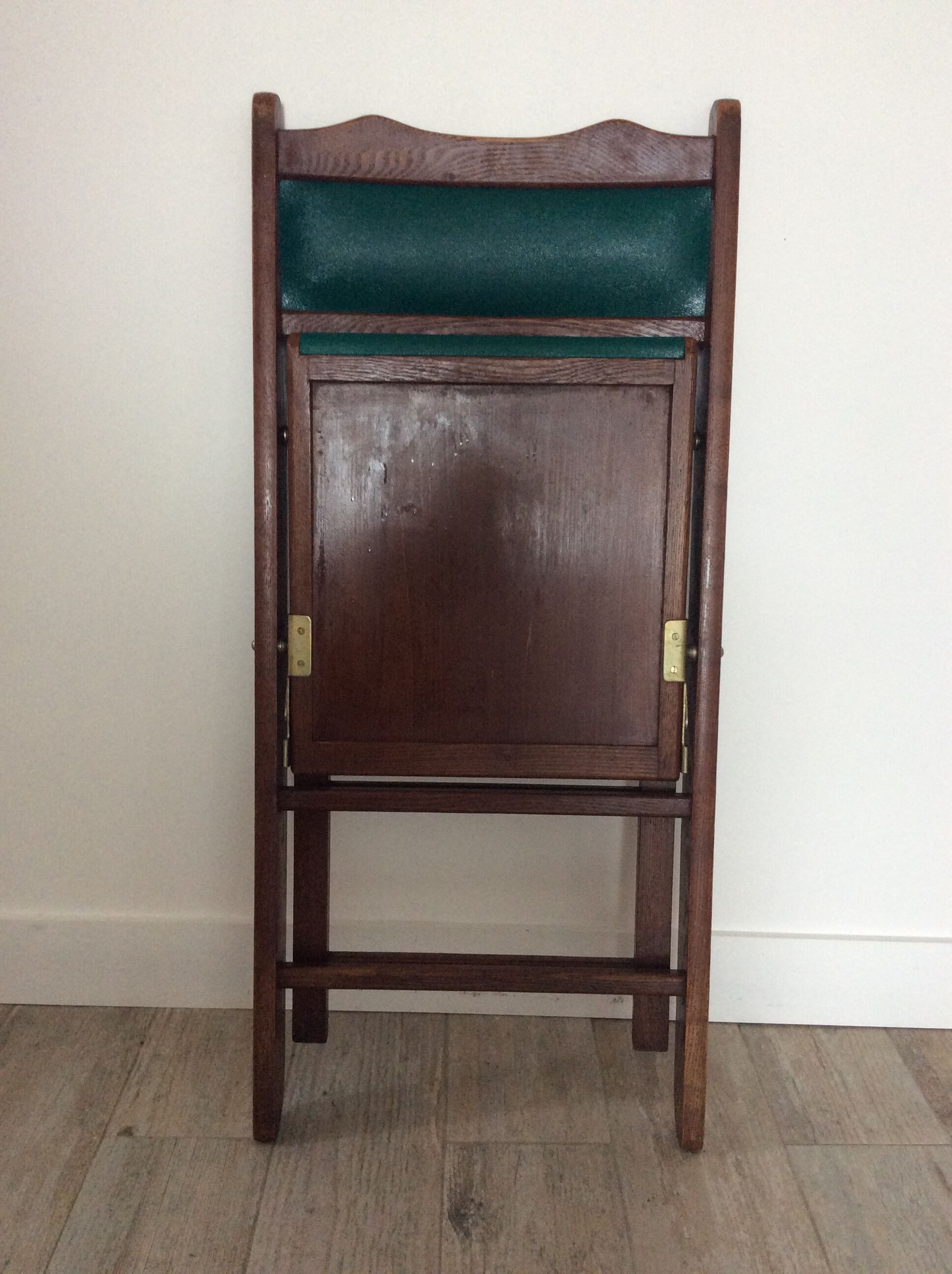 Chaise pliante en bois et skaï vert