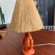 Vintage ceramic and raffia lamp
