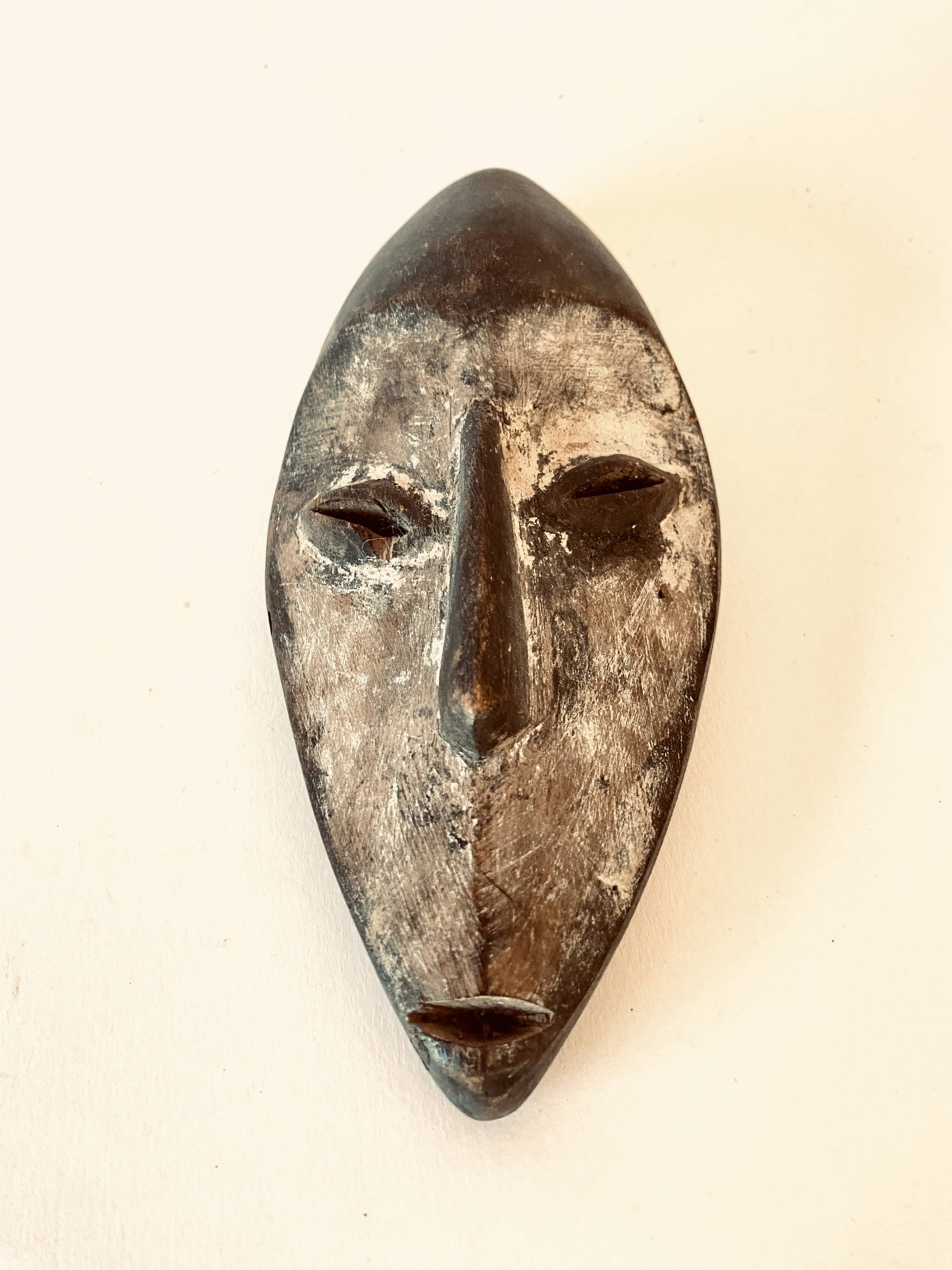 African mask, Fang tribe, wood and kaolin