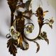 Pair of gold wall sconces with porcelain flowers