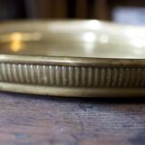 Golden service tray in vintage brass