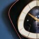 Horloge formica vintage pendule murale silencieuse "SMI noir orange"