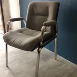 Chrome and wood armchair from the 70s