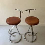 Bar stools in tubular chrome and tan leather, 1970s