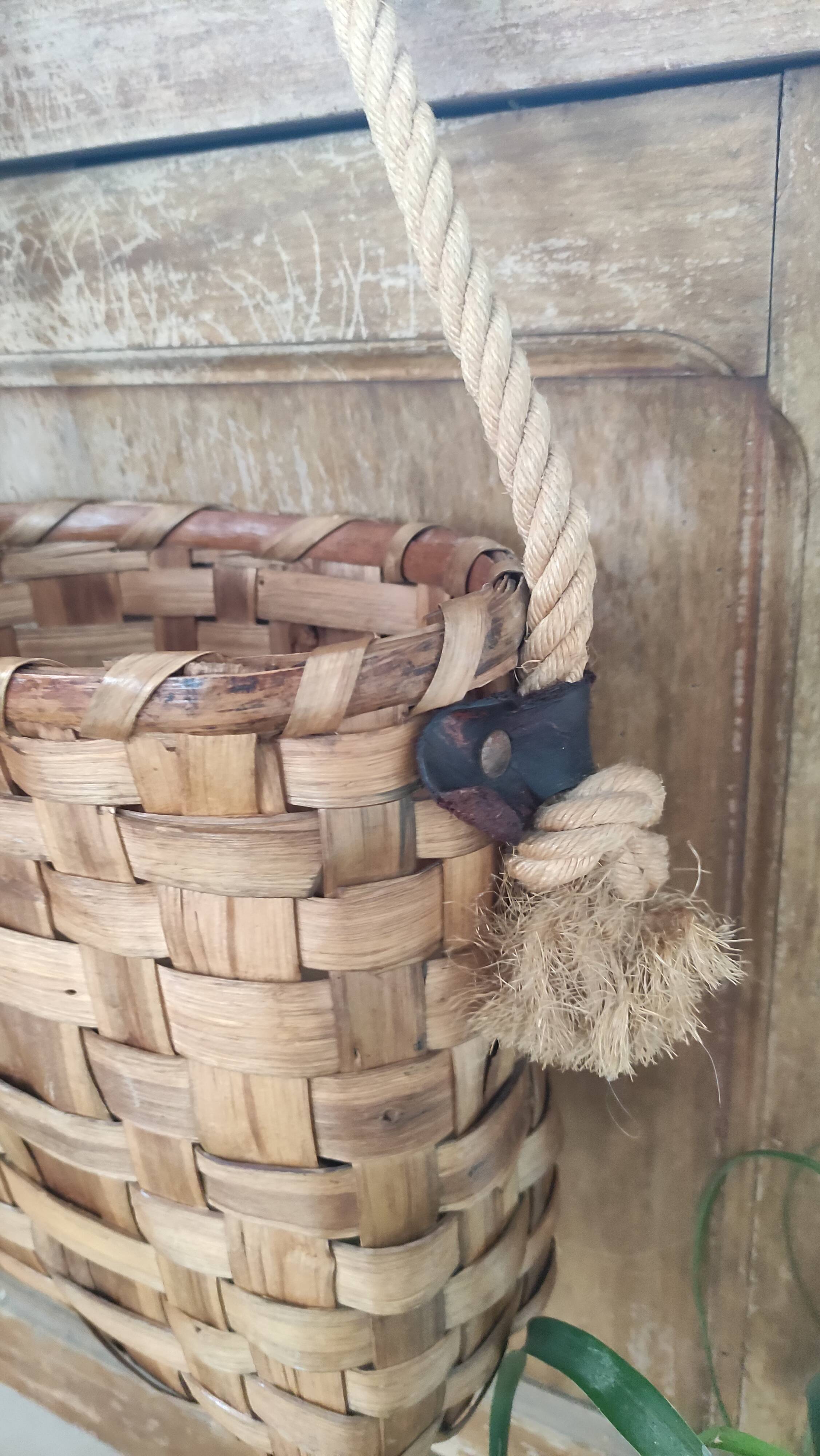 Basket or bag to put or hang leather, rope, brass and rattan
