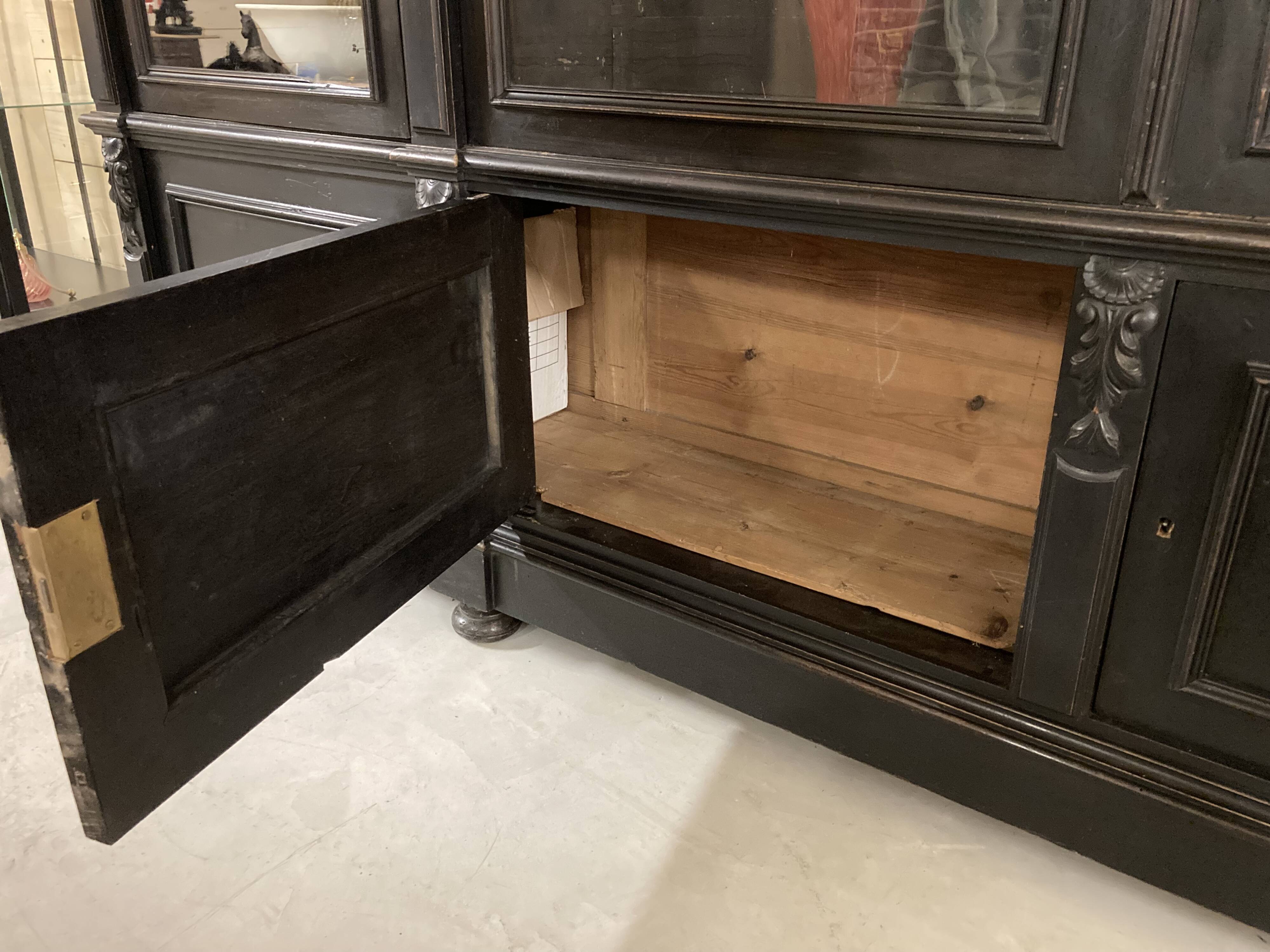 Library from the Napoléon III era in blackened pear wood.