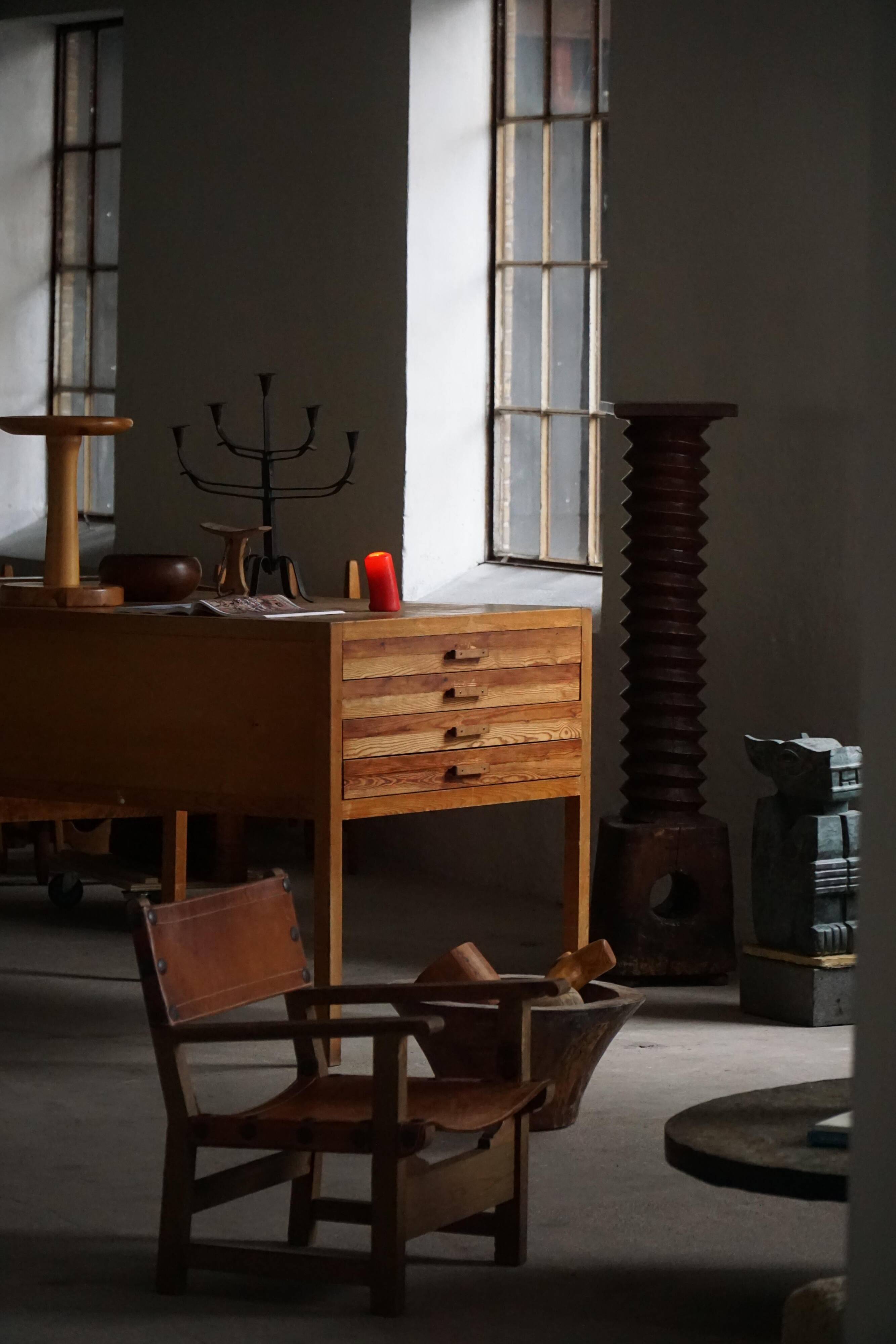 Pair of Spanish brutalist armchairs from the 1960s, wood and leather.
