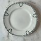Set of 2 Saint Amand plates with laurel crown decoration.