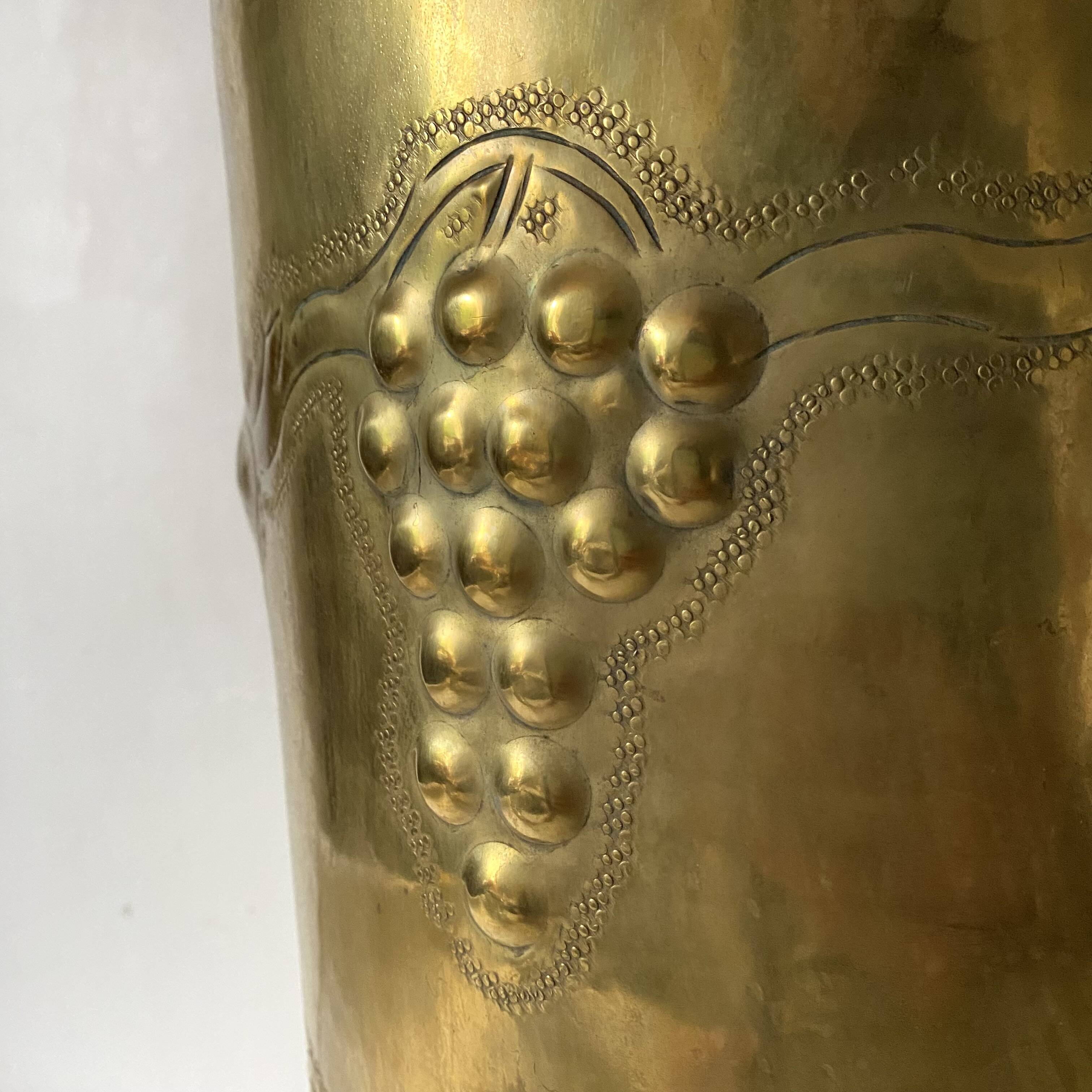 Umbrella stand in embossed golden brass