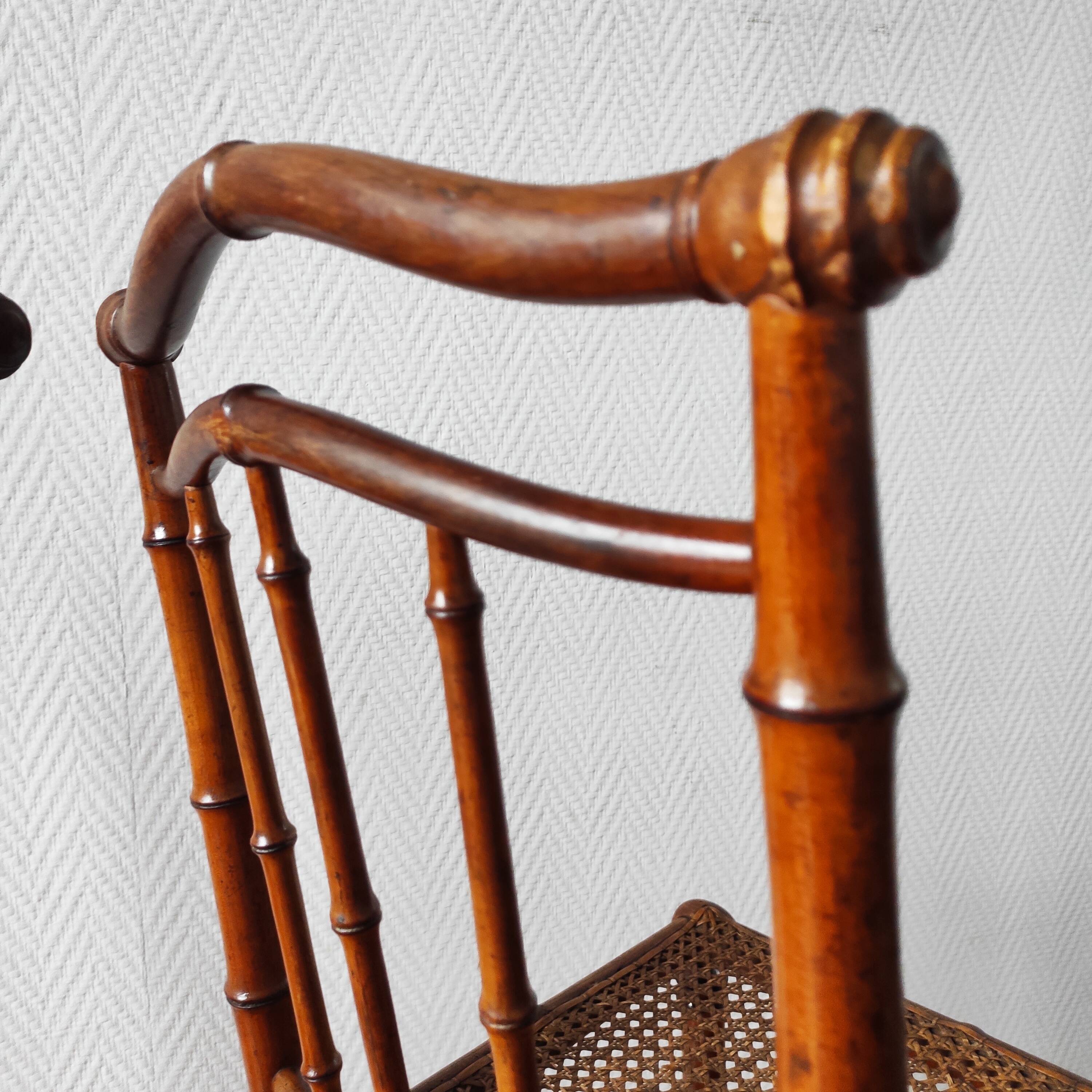 Pair of turned wood and cane chairs