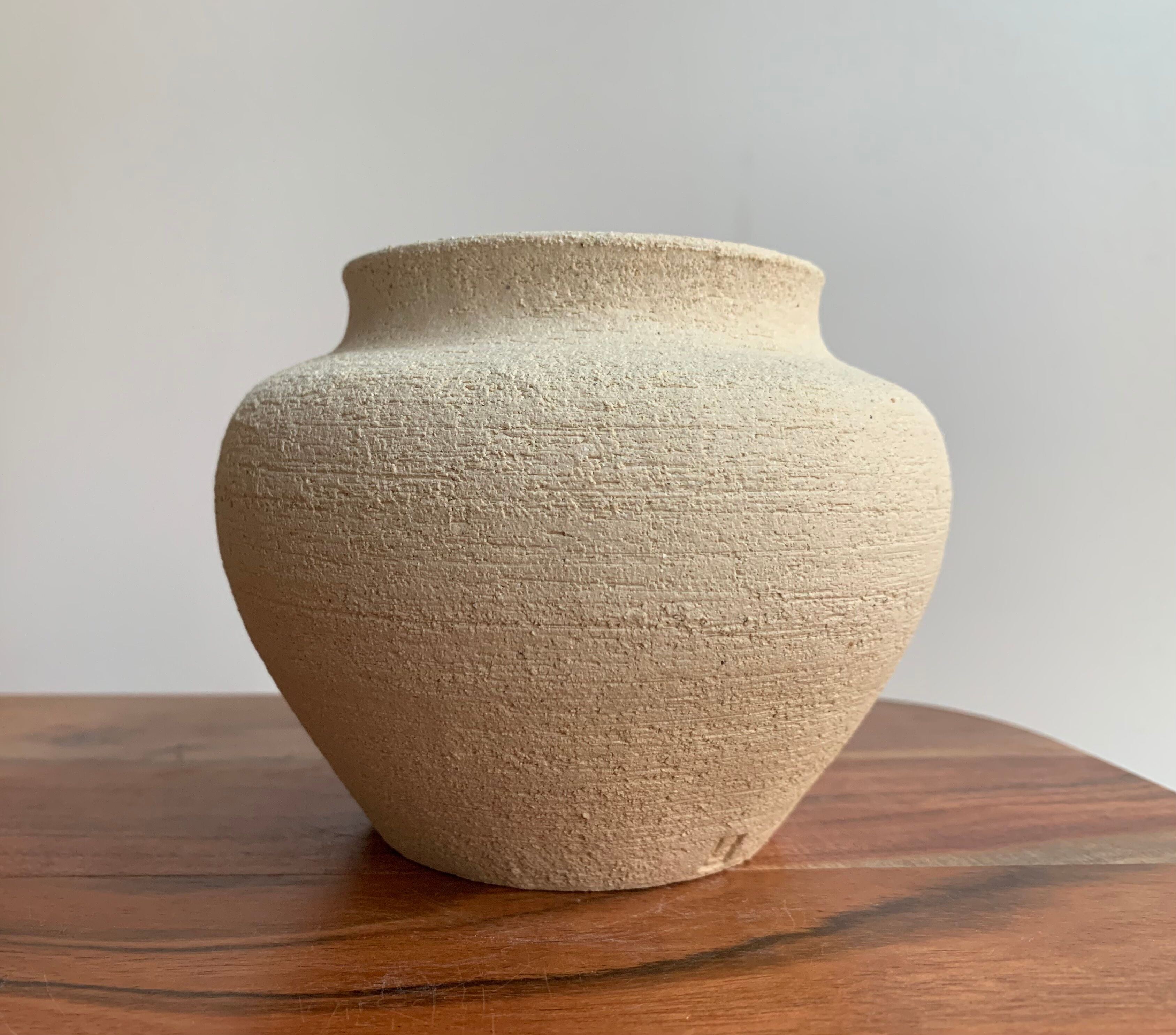 Small white sandstone vase