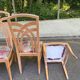 2 dining or kitchen chairs with high backs and fabric.