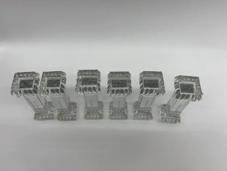6 Portieux Art Deco knife rests in transparent moulded glass, French glassware from the 1930s.