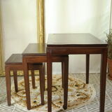 Pull-out tables in mahogany and vintage brass