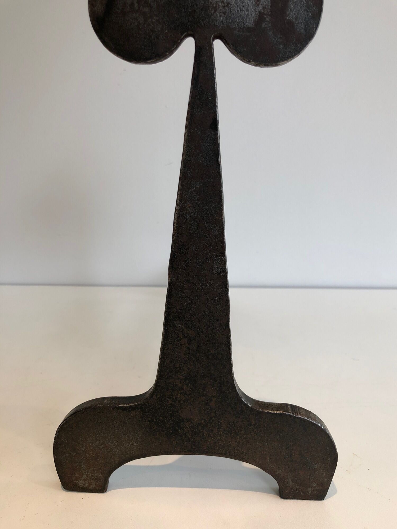 Pair of wrought steel and iron chenets with clover decorations 1950