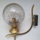 Pair of vintage gold wall sconces with transparent globes