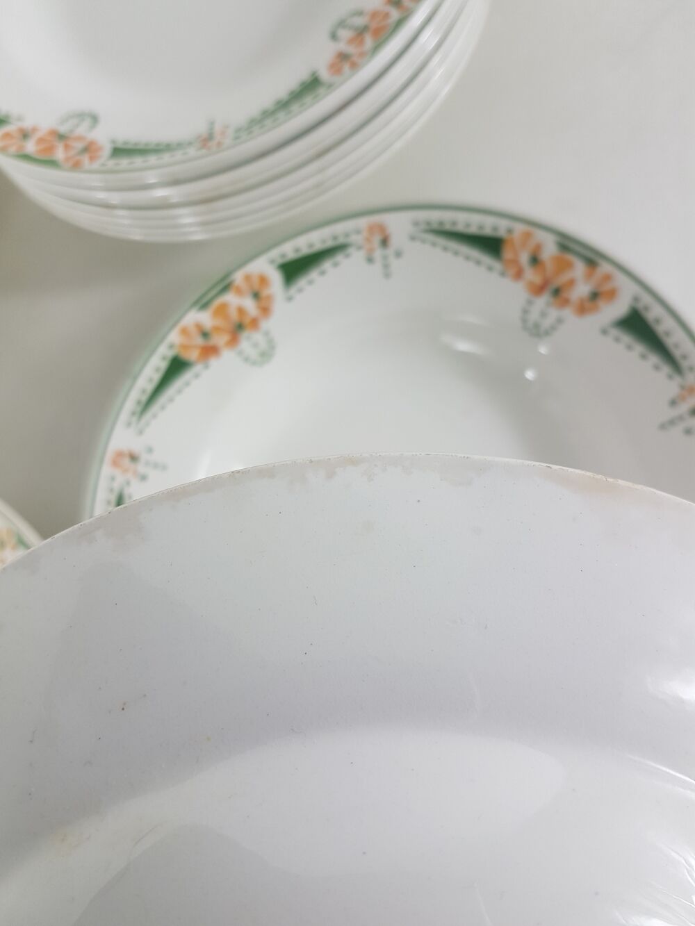 12 hollow plates made of Longwy earthenware