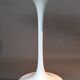 Tulip pedestal table in veined white marble and cast aluminum base, 1970/1980