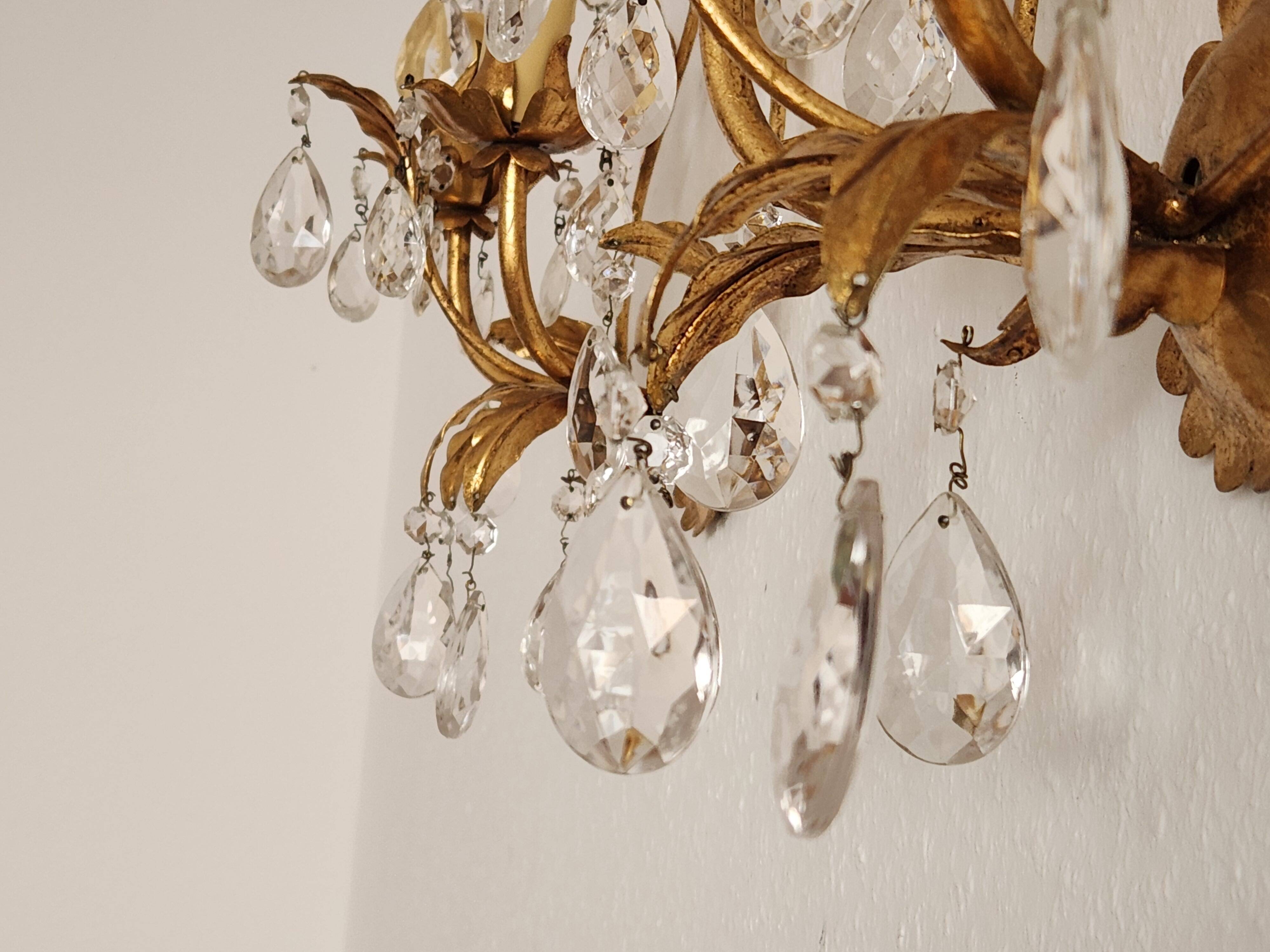 Hand-forged wall lamp gilded with gold leaf and crystals, Italy