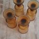 Set of four thick amber glass stemmed glasses.