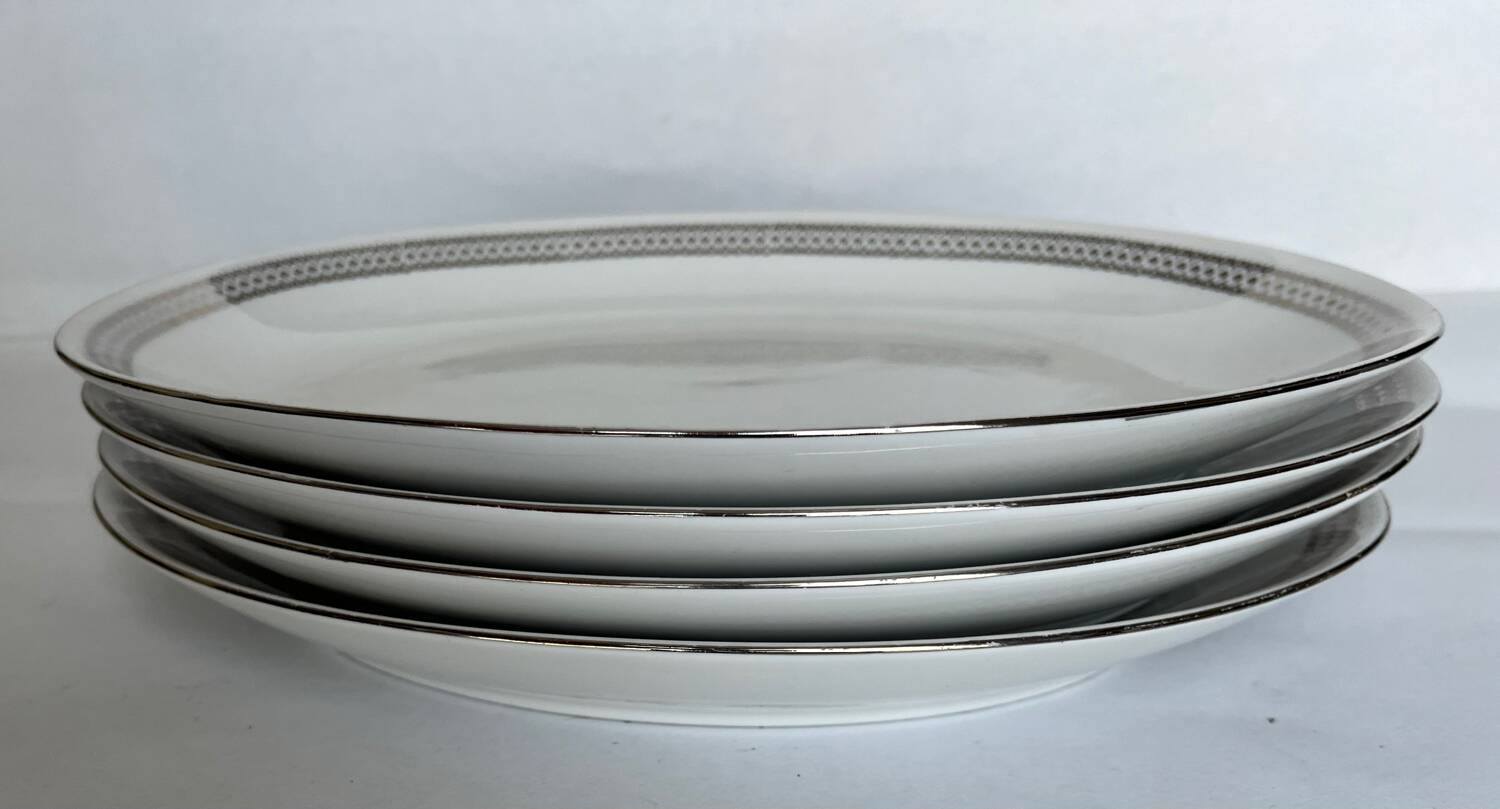 4 oval white porcelain dishes