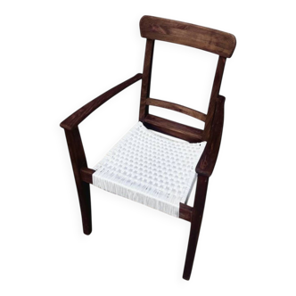 Scandinavian chair in wood and woven natural fibre.