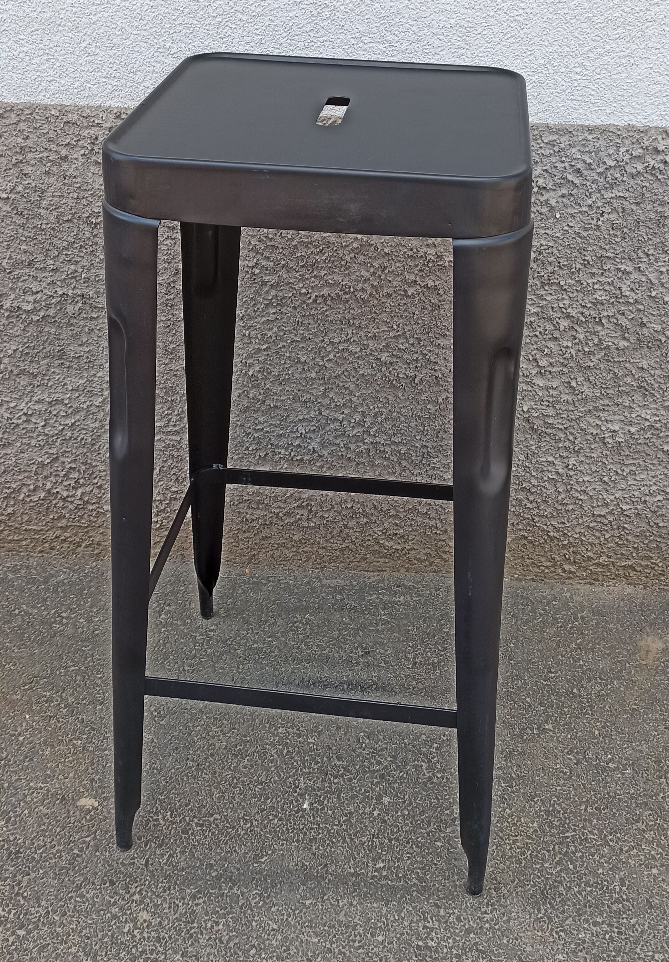 Pair of black metal stools