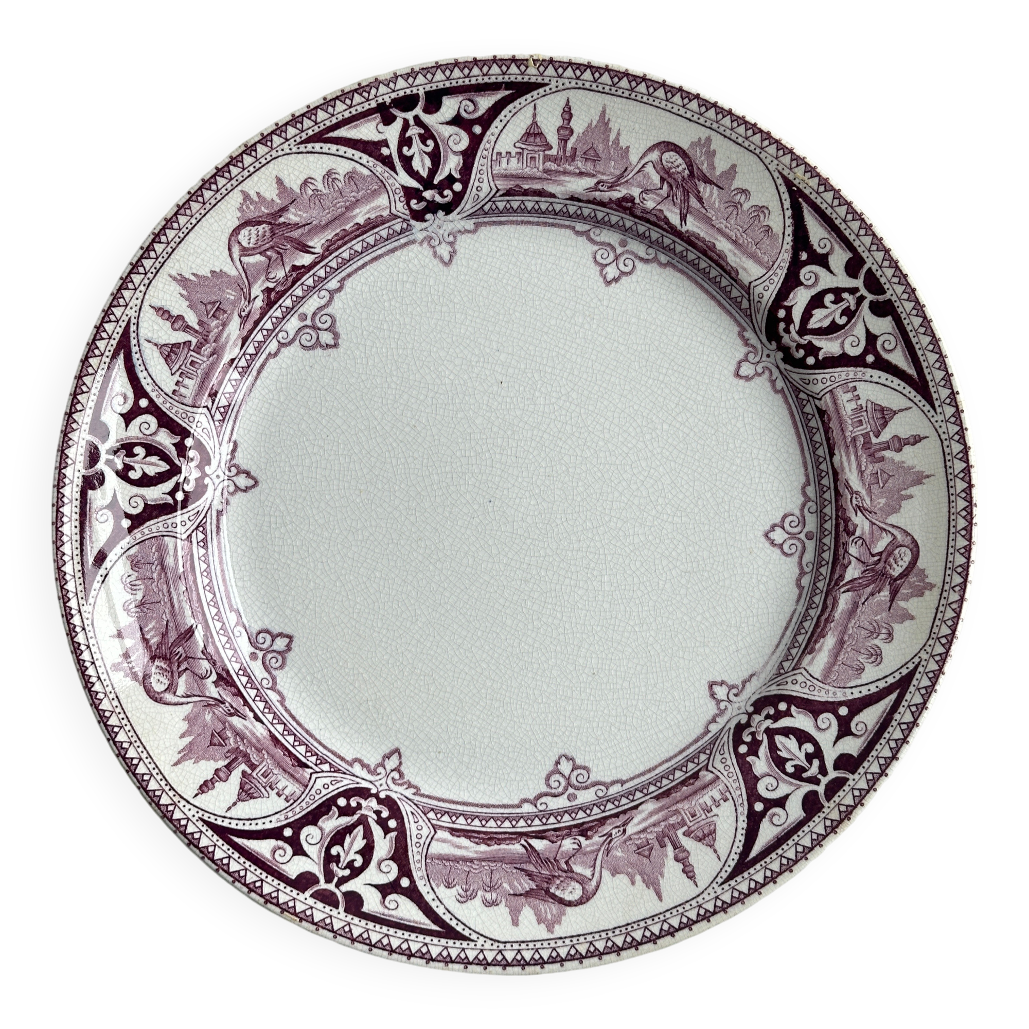 Antique plate with purple oriental decoration