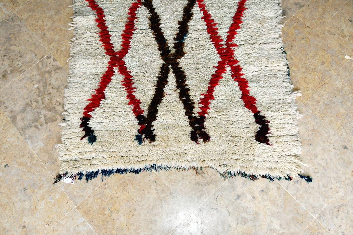 Small vintage beni ouarain rug