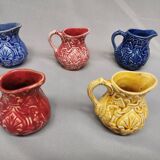 Set of 5 old onnaing barbotine jugs. creamer, sauce boat
