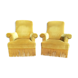 Paire de fauteuils à franges velours doré