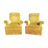 Pair of armchairs with golden velvet fringes