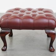 In very good condition elegant red/brown chesterfield ottoman made of cow leather