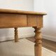 Large farmhouse-style coffee table with drawers, renovated oak.