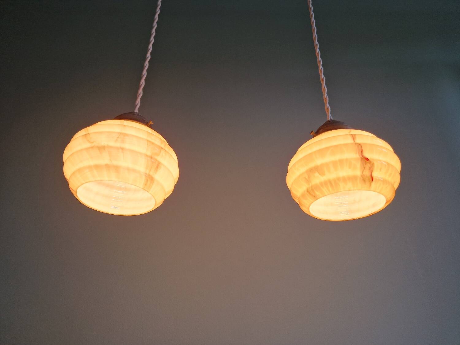 Pair of Art Deco marbled opaline pendant lights, 1920s-30s