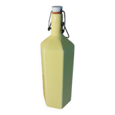 Bouteille en grès jaune vernissé, XXème s.