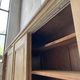 Large row of solid oak loom sliding doors