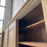 Large row of solid oak loom sliding doors