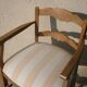 Fauteuil à accoudoirs dossier bas