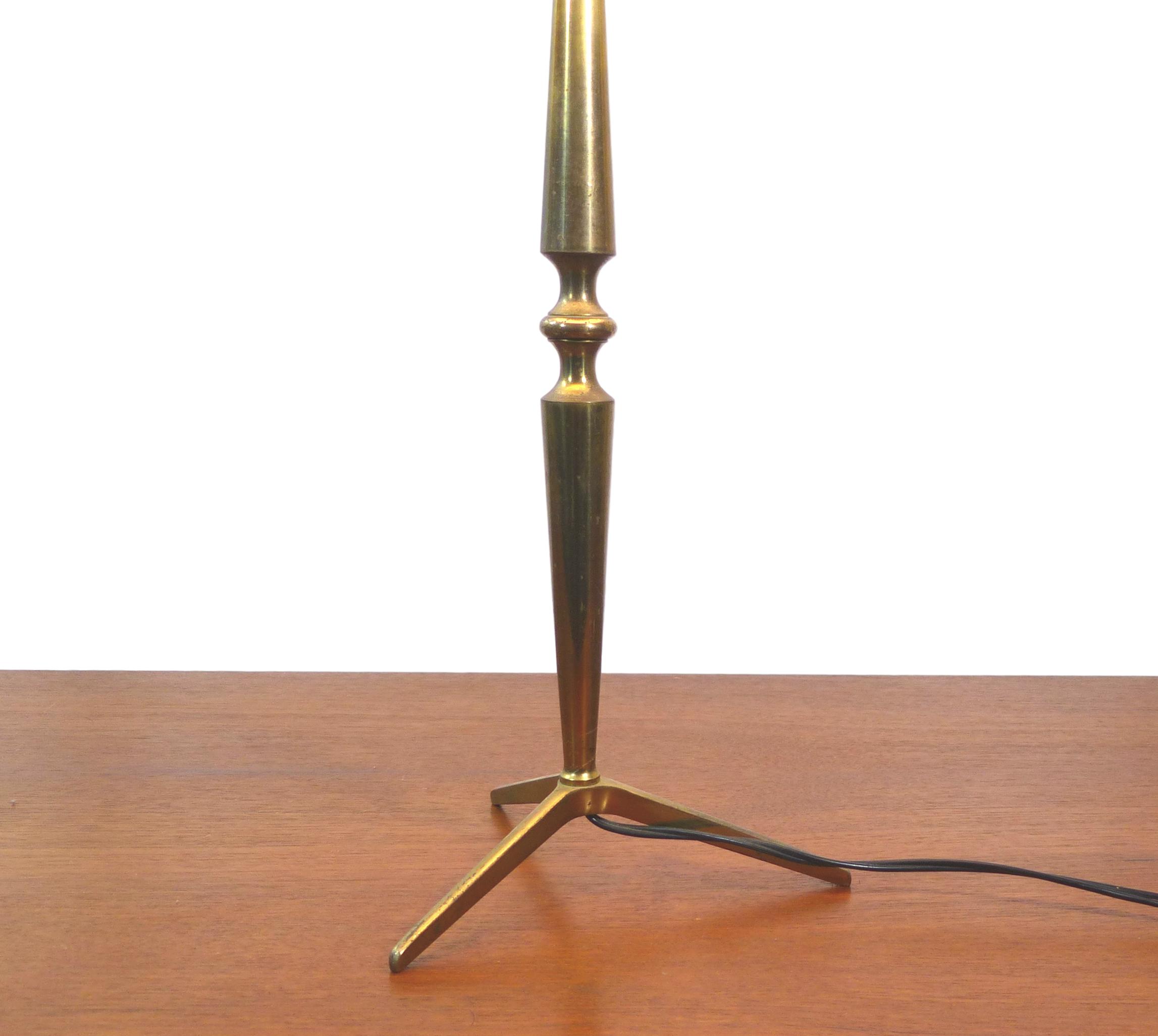 Golden brass tripod table lamp