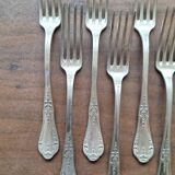 Set of silver metal forks