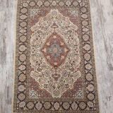 Tapis persan fait main en laine et soie