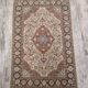 Handmade Persian wool and silk rug