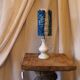 Blue alabaster floor lamp with a handmade cyanotype lampshade.